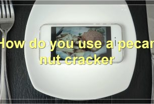 How do you use a pecan nut cracker